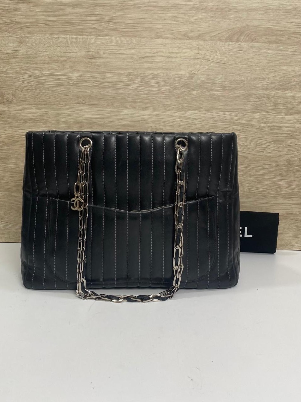 CHANEL Black Vertical-Stitch Quilted Leather Shoulder Bag with Silver Chain